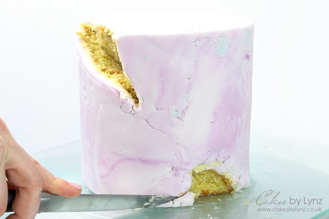 Cutting the hole for a geode cake